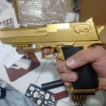 Pistola Dorada